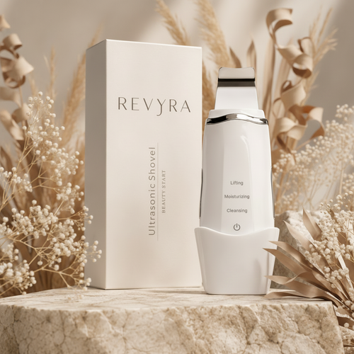 Ultrasonic Facial Cleanser by Revyra on stone surface with soft natural light